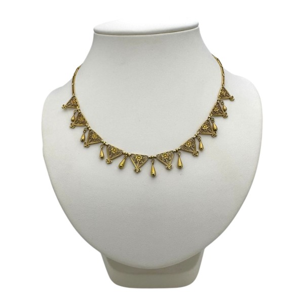 COLLIER COLLERETTE MOTIF FLEUR ET VOLUTE EN OR 18K